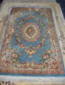 HEAVY QUALITY EMBOSSED WASHED CHINESE CARPET OF AUBUSSON DESIGN, with sky blue field with off-