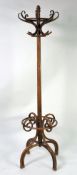 LARGE PILLAR HAT AND COAT STAND with hardwood cluster column, with two tier bentwood top, on