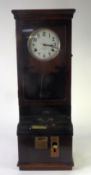 INTERNATIONAL TIME RECORDING CO., LONDON, CLOCKING-IN CLOCK, in varnished oak case, silvered