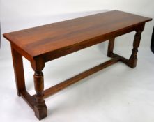 JACOBEAN STYLE OAK OBLONG SIDE TABLE, on four cup and cover supports with H stretchers, 6ft x 3ft (