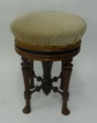 VICTORIAN ROSEWOOD CIRCULAR PIANO STOOL with revolving raised and fall return, the seat