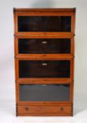 BARRISTER'S BOOKCASE: 1920s Globe Wernicke oak sectional bookcase, complete with single drawer