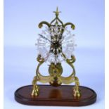 LATE VICTORIAN BRASS SKELETON CLOCK WITH CHAIN-DRIVEN FUSEE MOVEMENT with pendulum, pierced and