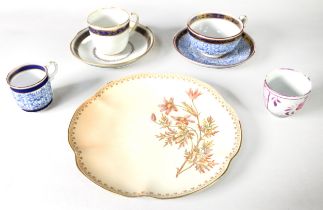 THREE LATE 18th CENTURY DERBY PORCELAIN TEACUPS AND TWO SAUCERS, with royal blue and gilt floral