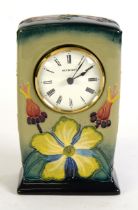 MOORCROFT: Rosehip pattern Moorcroft Pottery quartz mantel clock, fully marked and dated 93 to the
