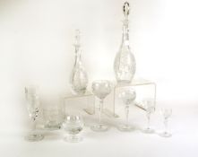 TABLE SERVICE OF CUT GLASS, WHEEL ENGRAVED WITH VINE LEAVES AND BUNCHES OF GRAPES, complete for
