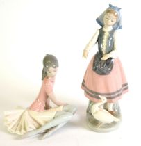 LLADRO PROCELAIN FIGURE OF A YOUNG WOMAN feeding a goose 10 1/4 high (26cm) and a LLADRO FIGURE OF A