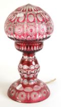 RUBY STAINED AND CUT GLASS TABLE LAMP and cone shaped matching shade, 14 1/2in (36.8cm) high