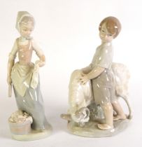 NAO SPANISH PROCELAIN GROUP OF A BOY LEANING ON A RAM 8 3/4" high (22.5cm) and a NAO figure of a