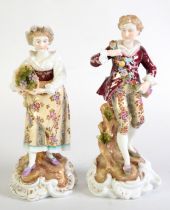 PAIR OF LATE 19th CENTURY VOLKSTEDT, GERMAN, PORCELAIN FIGURE OF A COURTIER AND A WOMAN, carrying