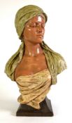 GOLDSCHEIDER, VIENNA, LARGE TERRA COTTA BUST OF A FEMALE FIGURE depicted wearing a long headscarf