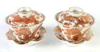 PAIR OF CHINESE PORCELAIN RICE BOWL, covers and stands, decorated in iron red and gilt with dragons,
