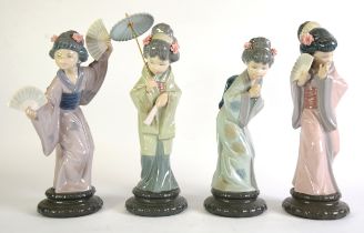 SET OF FOUR LLADRO PORCELAIN FIGURES, of Geishas, on black pedestal style bases, approximately