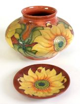 MOORCROFT POTTERY SQUAT CIRCULAR BOWL, with tube lined decoration of three large yellow sunflowers