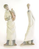 LLADRO PORCELAIN LARGE FIGURE OF A DOCTOR holding up a new born baby 14" high (35.5cm) ANOTHER