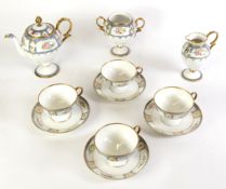 JAPANESE NORITAKE CHINA COFFEE SERVICE for four persons, 11 pieces, the broad border painted with