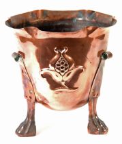 EARLY TWENTIETH CENTURY ARTS & CRAFTS COPPER JARDINIERE the 'U' shape bowl with crimped rim,