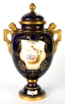 COALPORT CHINA LARGE TWO HANDLED OVULAR VASE AND COVER, the domed cover having gilt pineapple