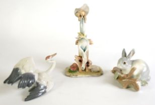 LLADRO MODEL OF A RABBIT behind a log 3 1/4" high (8.25cm) LLADRO MODEL OF A CRANE (minor chip to