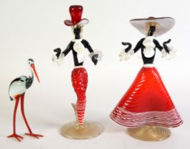 PAIR OF MURANO GLASS ELEGANT FIGURES, man wearing a top hat and a wide-brimmed hat, on gold speckled