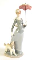 LLADRO PORCELAIN LARGE GROUP, an elegant lady walking her dog on a lead and carrying a parasol, on
