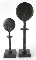 AFRICAN SCULPTURE BLACK METAL FERTILITY FIGURE in totem form, with moon shaped head, on square