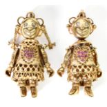 TWO 9ct GOLD AND WHITE PASTE SET PIERCED AND ARTICULATED FIGURES OF GIRLS, as pendants, 1 ½” (4cm)