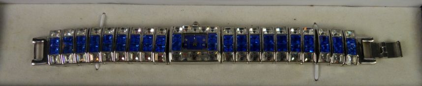 GIANNI SABATINI, LADY'S QUARTZ BRACELET WATCH, model T493CNL, the tiny oblong blue diamond set