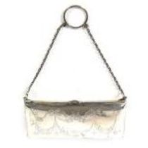 GEORGE V ENGRAVED SILVER EVENING PURSE, of oblong form with tan leather interior and chain handle,