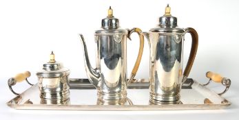 ART DECO SILVER COFFEE SERVICE OF THREE PIECES, with high domed lids, embossed fan shaped motifs