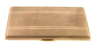 GENTLEMAN'S 9ct GOLD POCKET CIGARETTE CASE, oblong with canted edges and all-over engine turned