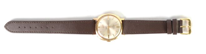GENT'S ROTARY 9ct GOLD SWISS WRISTWATCH, with 17 jewels movement, circular silvered dial with