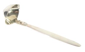 GEORG JENSEN, DENMARK, SILVER SAUCE LADLE, the handle rising vertically from the double lipped