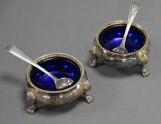 PAIR OF VICTORIAN SILVER OPEN SALTS, each of circular, bellied form with paw feet, beaded borders