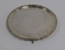 GEORGE VI SILVER SALVER BY HUTTON & SONS, with plain centre, raised border and paw feet, 12” (30.