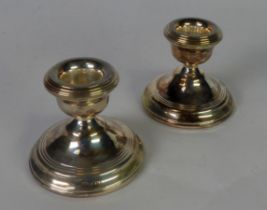 PAIR OF WEIGHTED SILVER CANDLE HOLDERS, 2 ½” (6.4cm) high, Birmingham 1970, (2)