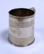 EDWARDIAN SILVER HALF-PINT MUG of tapered straight-sided form, with two broad ribbed girdles and