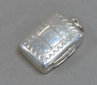 GEORGE III ENGRAVED SILVER VINAIGRETTE BY COCKS & BETTRIDGE, the cover with bright cut border,