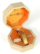 BULOVA GOLD PLATED LADY'S WRIST WATCH with integral BARK TEXTURED BRACELET, in box as supplied