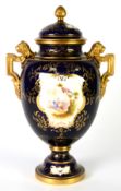 COALPORT CHINA LARGE TWO HANDLED OVULAR VASE AND COVER, the domed cover having gilt pineapple