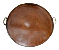 GEORGE III MAHOGANY AND OAK galleried circular tea tray with brass handles 20" (51cm) diameters