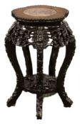 19th CENTURY CHINESE HARDWOOD AND PINK MARBLE INSET VASE STAND, with prunus carved apron over five
