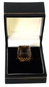 9ct GOLD DRESS RING set with a large oblong smokey quartz, 7.8gms, ring size N/O