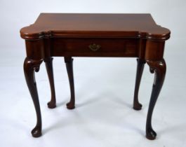 GILLOWS: George II style mahogany fold-over card table by Gillows of Lancaster. The fold-over top