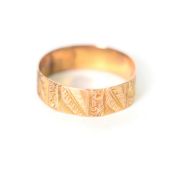 VICTORIAN 9ct GOLD BROAD BAND RING, heavily chased with a leaf, etc., design, Birmingham 1893, 2.