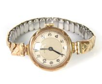 LADY'S ROLCO 9ct GOLD CASED WRISTWATCH wiht 15 jewels movement, circular silvered arabic dial,