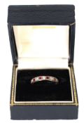 CHASED 9ct GOLD ETERNITY RING set with alternate red and white stones, 2.4gms, ring size Q/R, (c/r