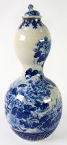 JAPANESE MEIJI PERIOD HIZEN PORCELAIN DOUBLE GOURD-SHAPE VASE with small cover, painted in