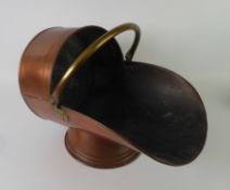COPPER CYLINDRICAL COAL SCUTTLE, with brass swing handle