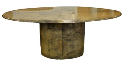 ALDO TURA, ITALIAN, COLOURED GOAT SKIN COVERED OVAL PEDESTAL DINING TABLE, with lacquered finish,